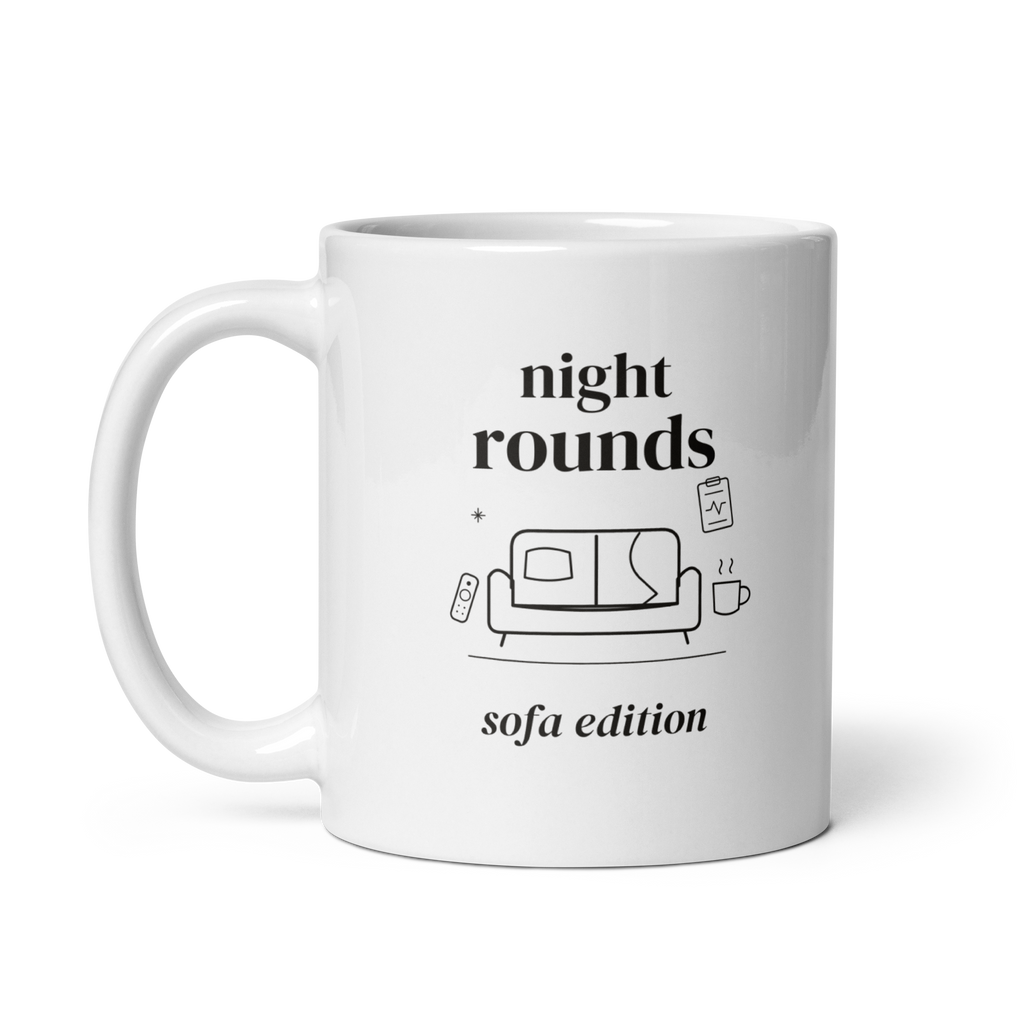 White 11 oz mug with handle on the left, showing Night Rounds, Sofa Edition lettering with a sofa, remote, mug and fictional chart. Supplier-generated mockup; not a physical sample.