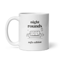 White 11 oz mug with handle on the left, showing Night Rounds, Sofa Edition lettering with a sofa, remote, mug and fictional chart. Supplier-generated mockup; not a physical sample.