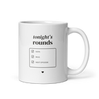 White 11 oz mug with handle on the right, showing Tonight’s rounds lettering and a Sofa, Mug, Next Episode checklist. Supplier-generated mockup; not a physical sample.