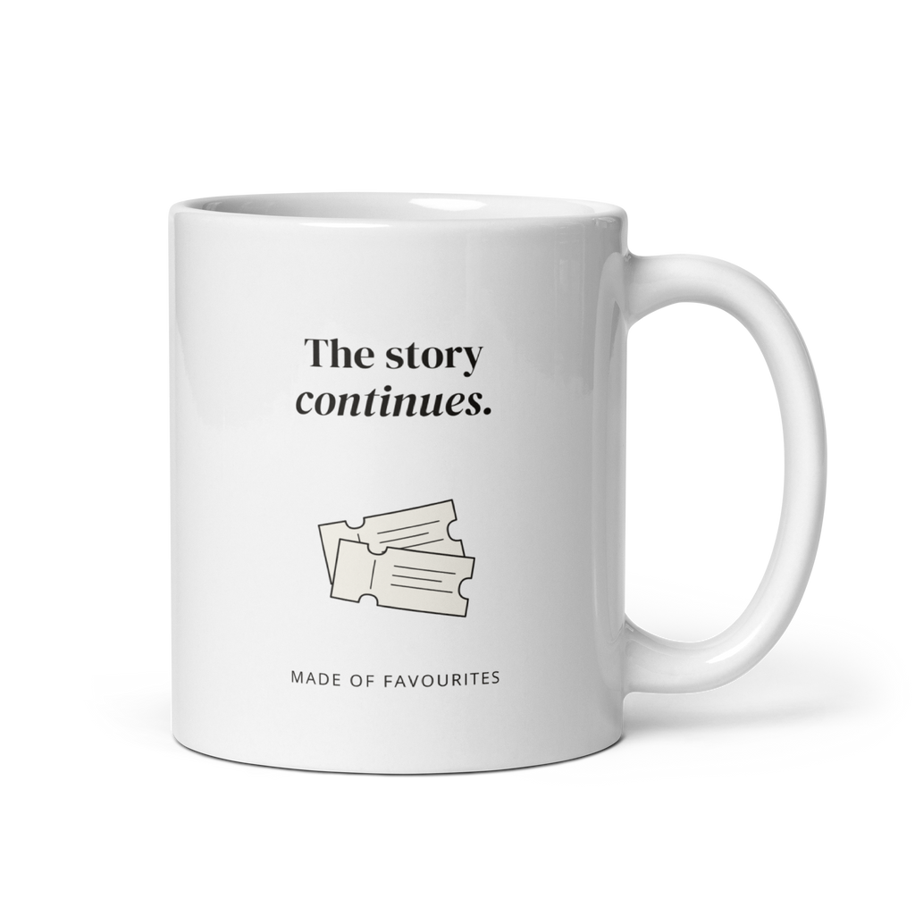 White 11 oz mug with handle on the right, showing The story continues lettering with two admission tickets. Supplier-generated mockup; not a physical sample.